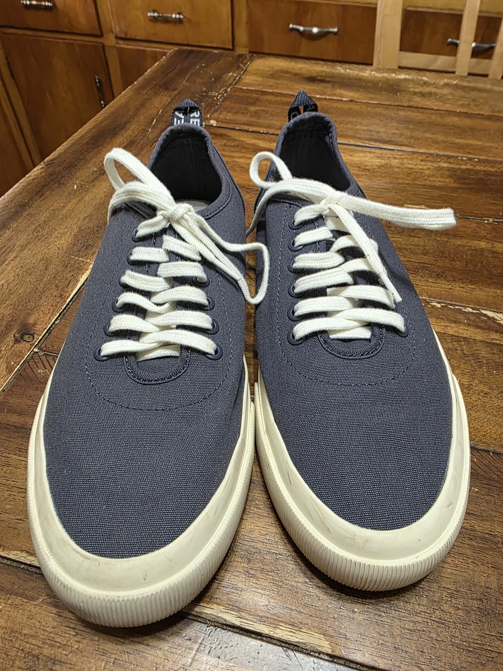 Tread sneaker by Everlane in navy/cream W10/M8